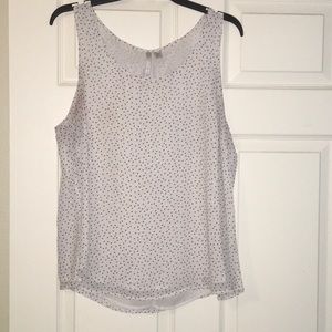 LC sleeveless top with bow on back